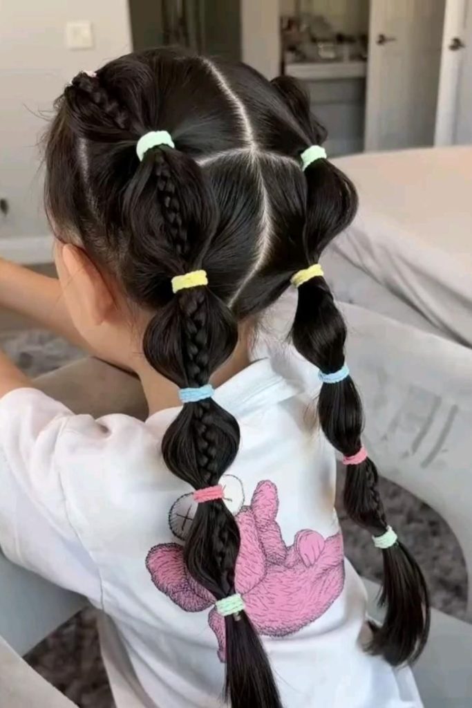 Bubble-tip braids bouncing with charm.