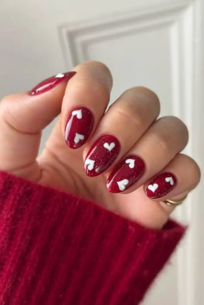 Cherry nails with tiny heart details