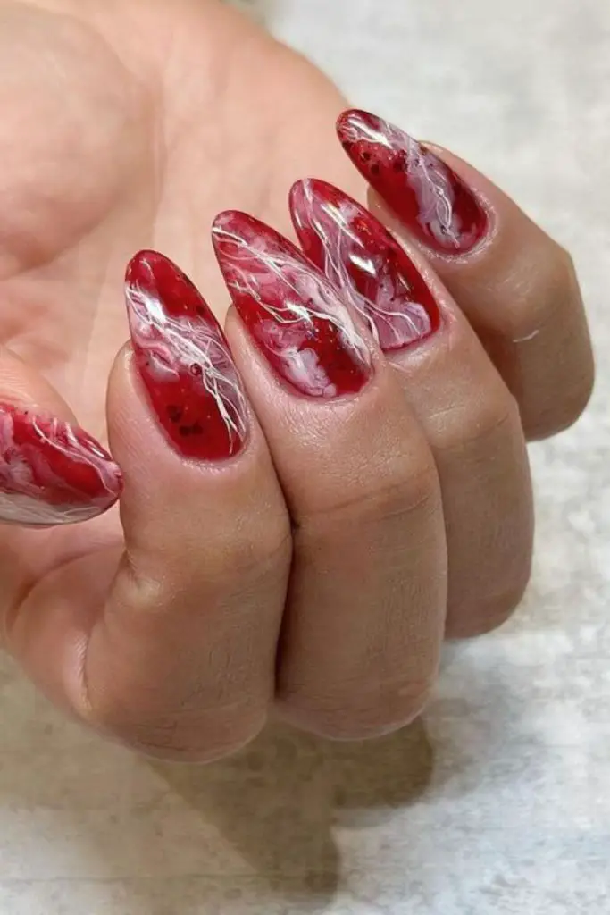 Cherry marble swirl artistic nail design