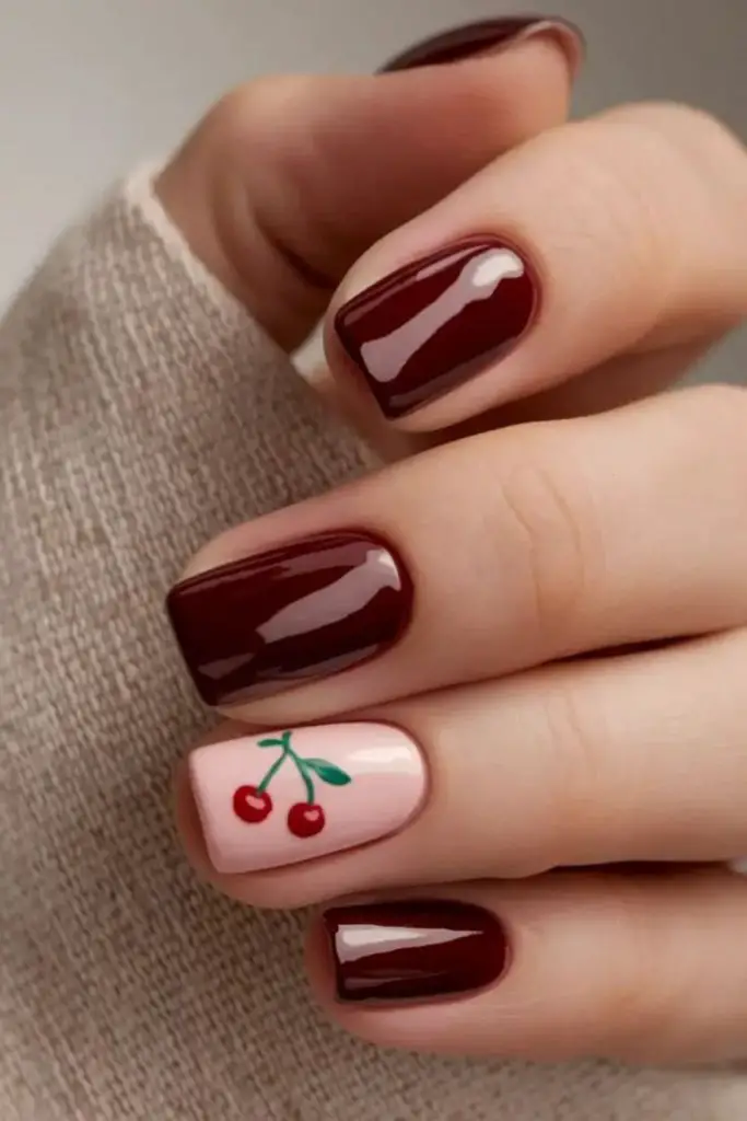 Short square nails with cherry polish