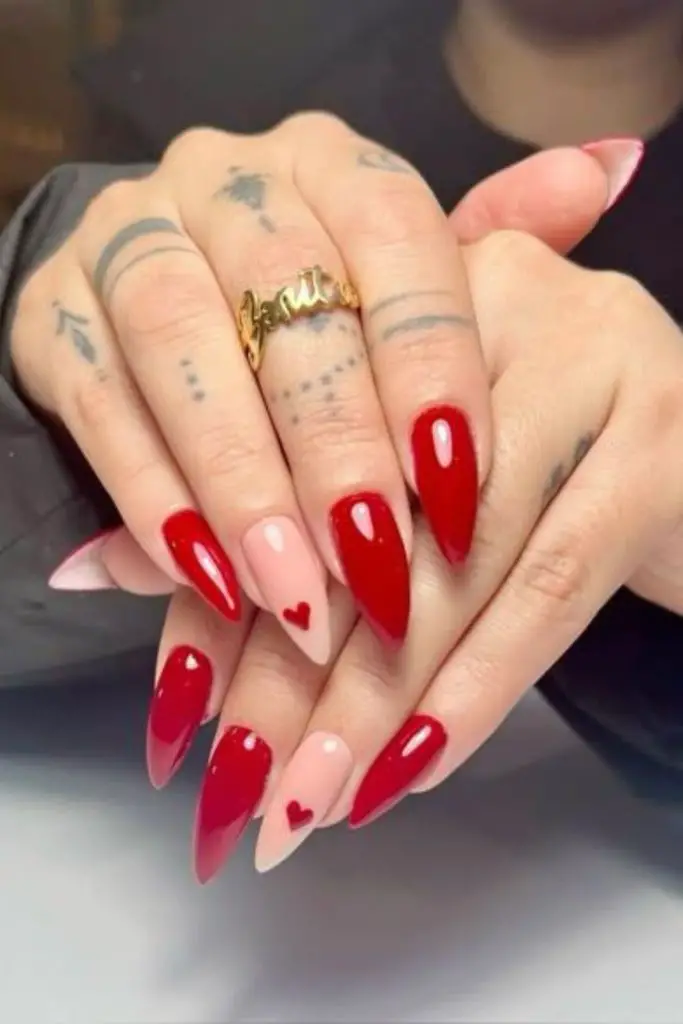 Bold cherry nails in stiletto shape