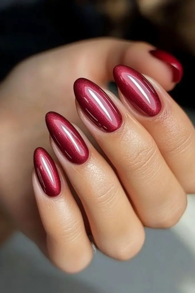 Chrome cherry nails with metallic shine