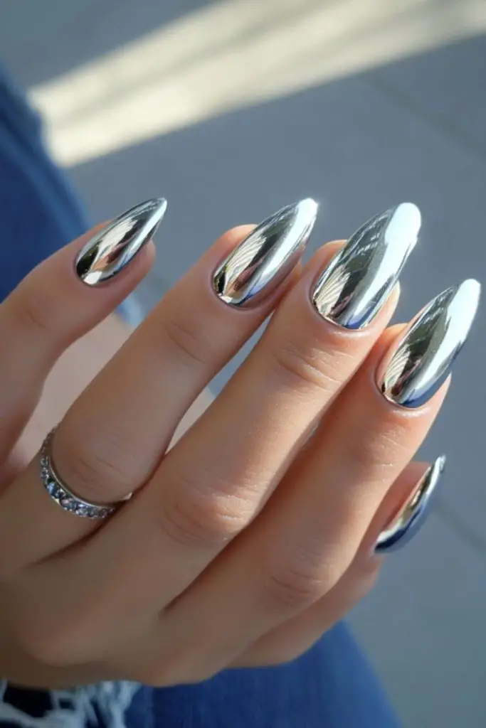 Reflective metallic silver futuristic nails.
