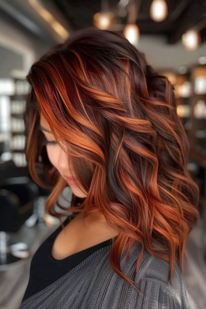 Copper fire streaks bold glowing strands