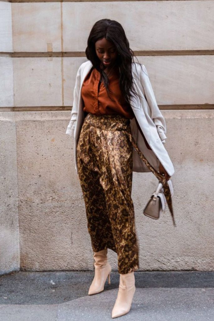 Copper satin blouse and pleated skirt