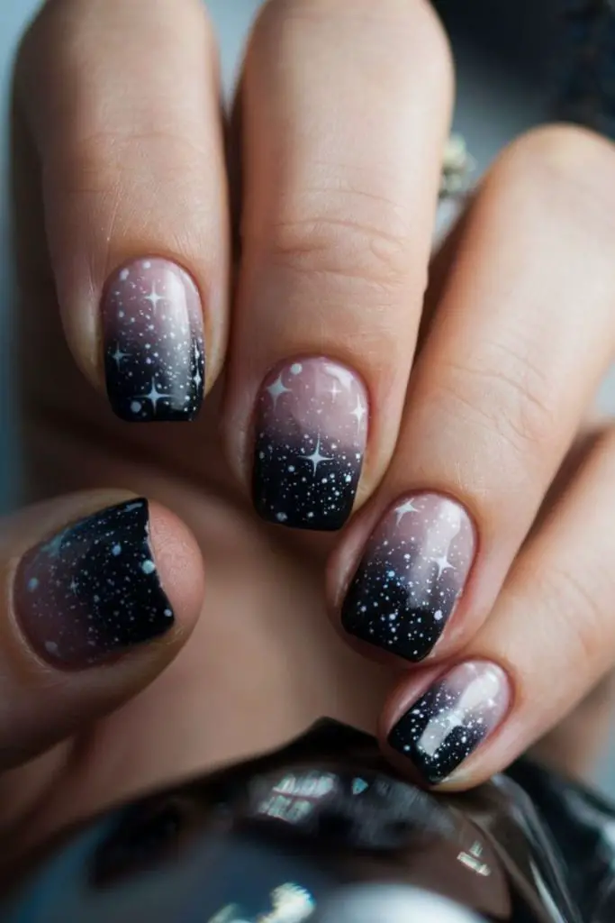 Starry speckled glitter cosmic nails