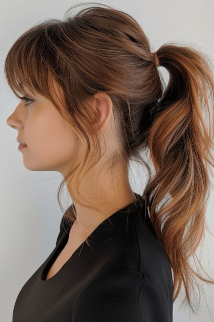 Curtain bangs with loose ponytail
