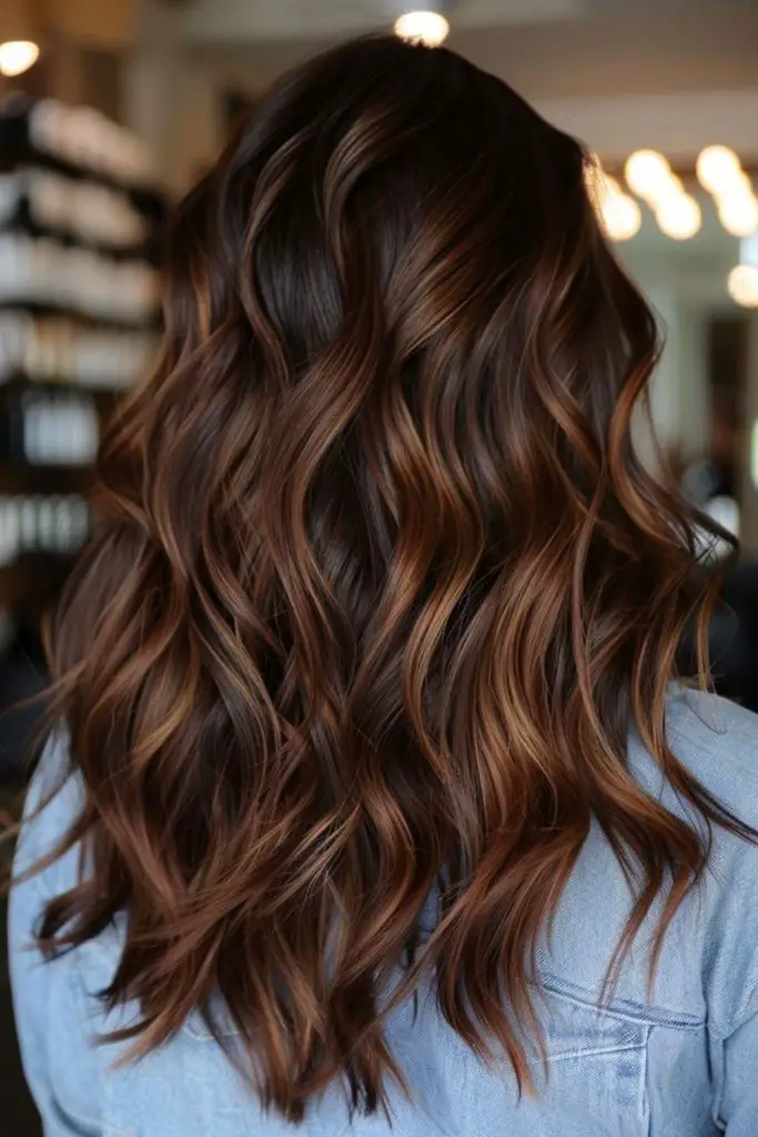 Ember glow curls with caramel shimmer