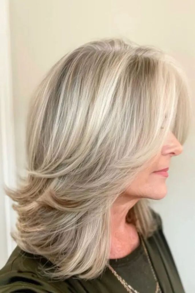 Flowing mid-length layered haircut style