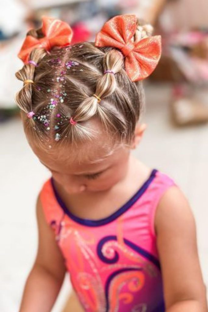 Glitter accent braids shimmering in light.