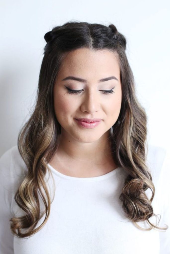 Half-up crown twist adds flattering lift