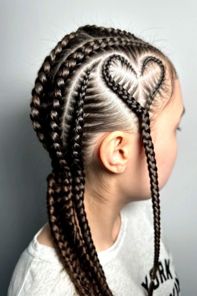 Heart-shaped side cornrows for sweet look.