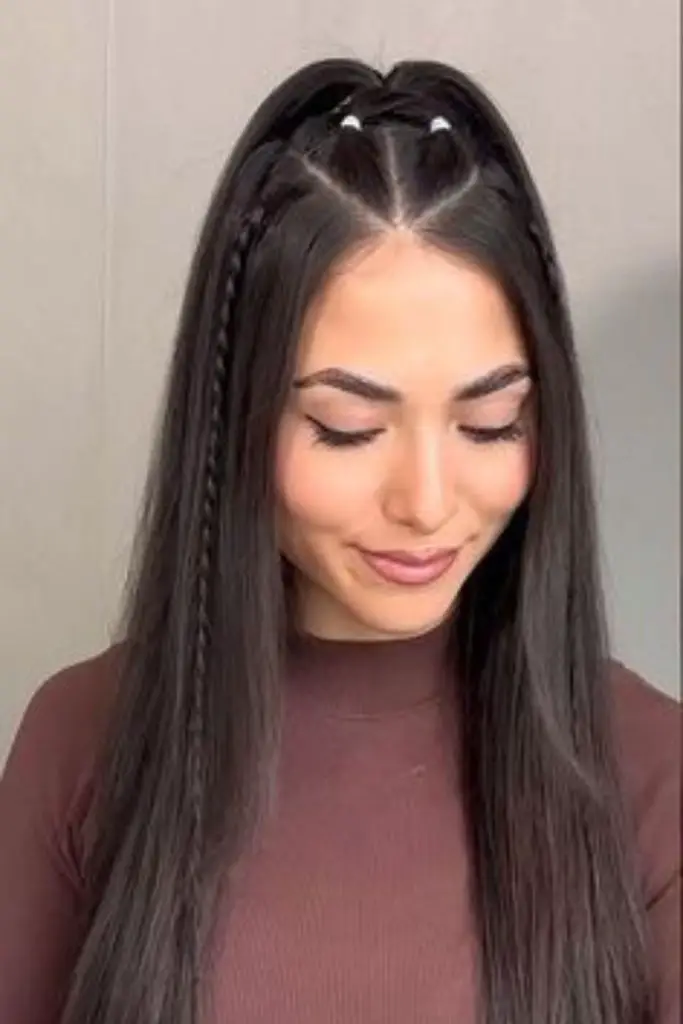 Tiny braids hidden in hair.