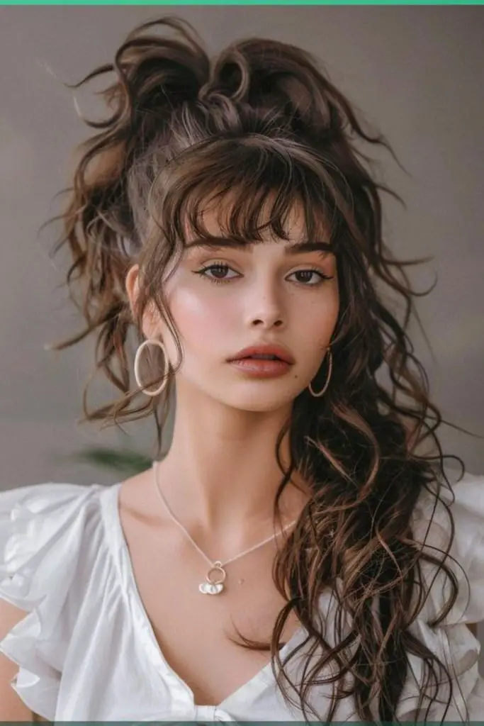 High curly ponytail with playful bounce.