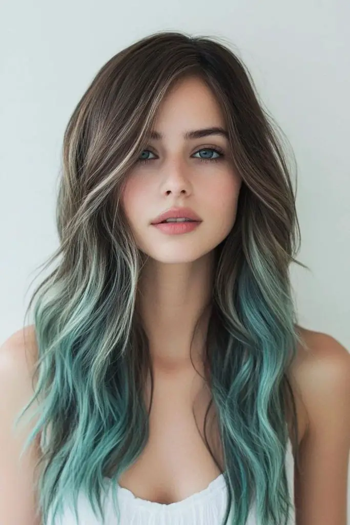 Bold jade green cascading hair.