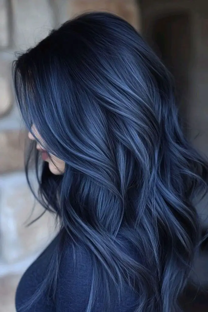 Dark midnight indigo hair shade.