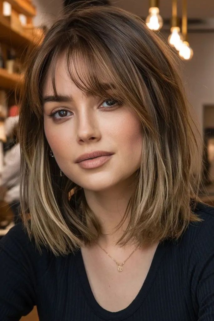 Modern lob haircut with layered fringe
