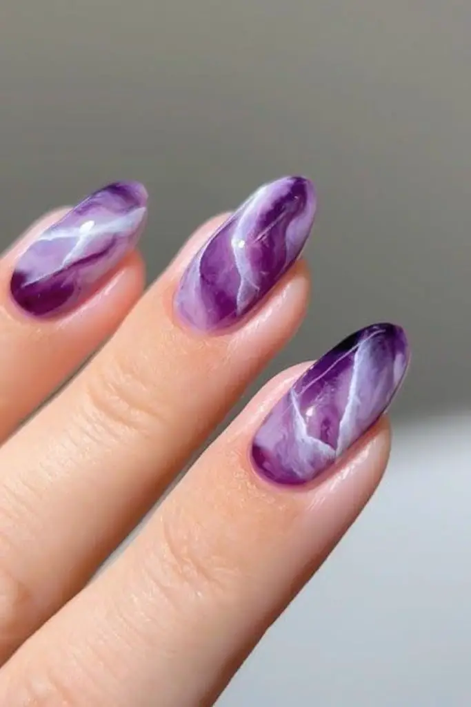 Purple white mystical marble nails