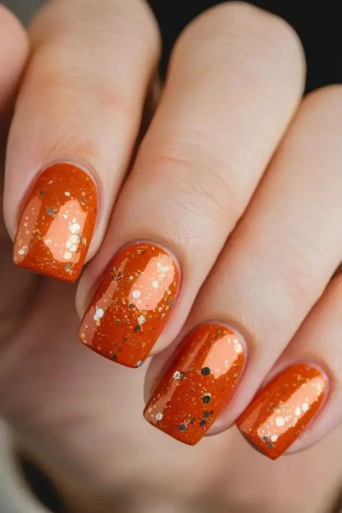 Pumpkin spice shimmer fall nail design