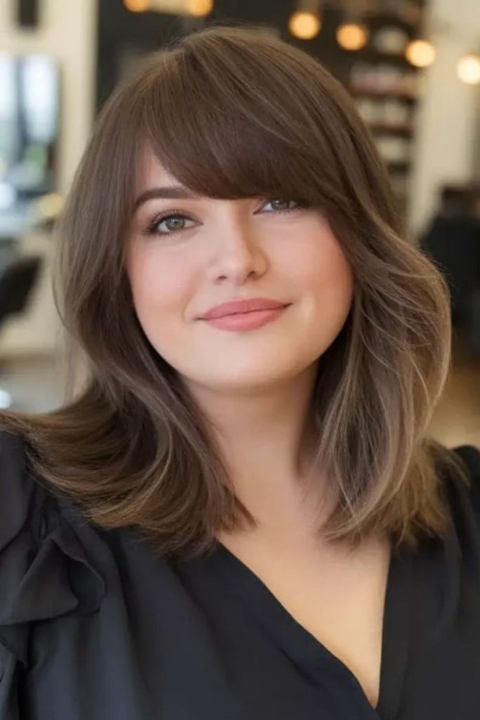 C shaped shoulder length layers hairstyle
