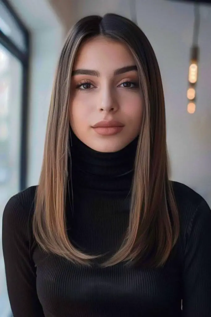 Sleek middle part with glossy shine