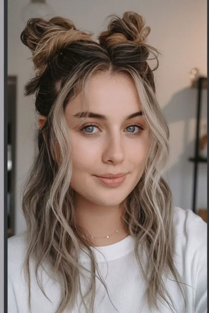 Playful double buns high style.