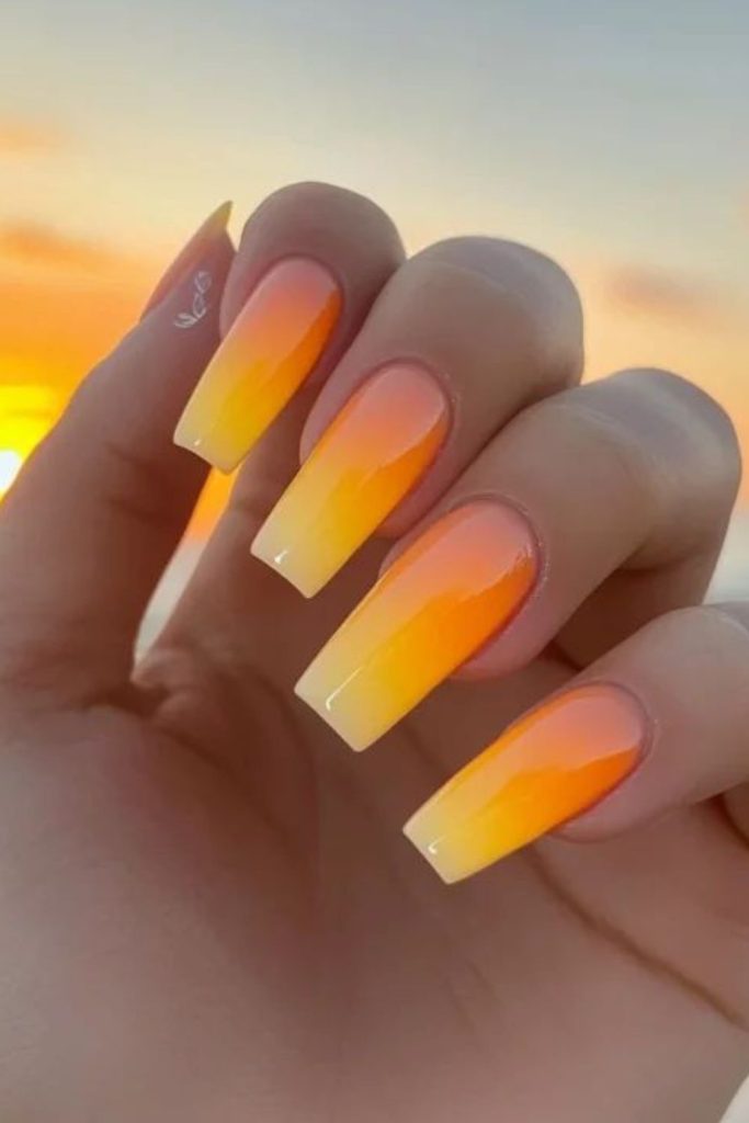 Golden yellow coral gradient nails
