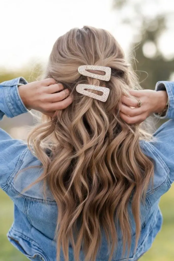 Tousled waves styled with jeweled clip