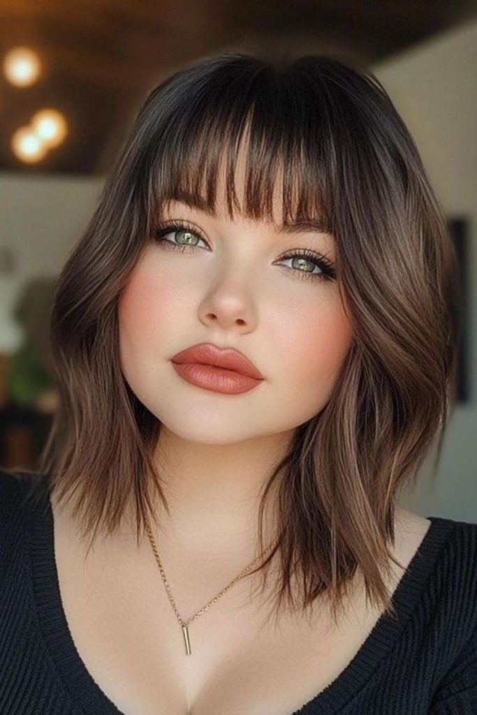 Wispy bangs long bob hairstyle women