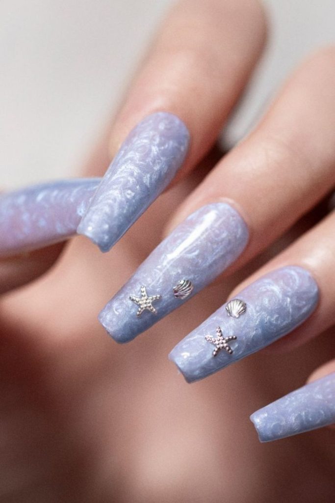 Arctic pearl icy blue nails.