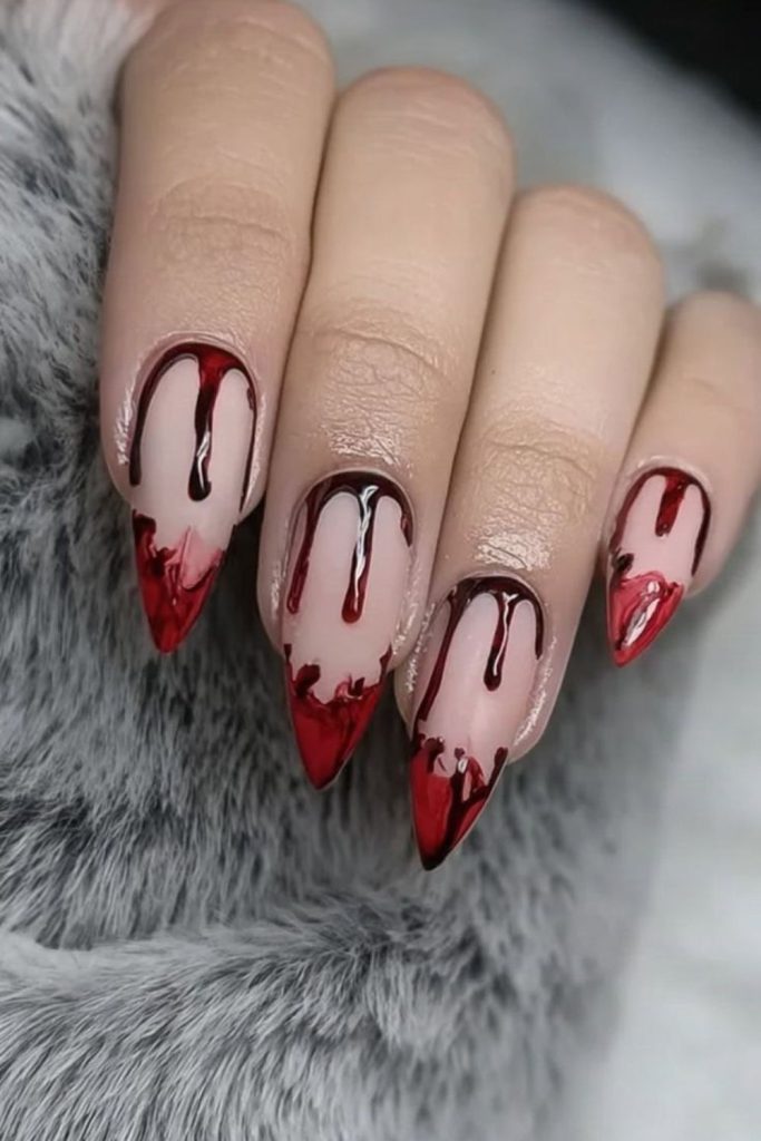Blood drip horror inspired nail look.