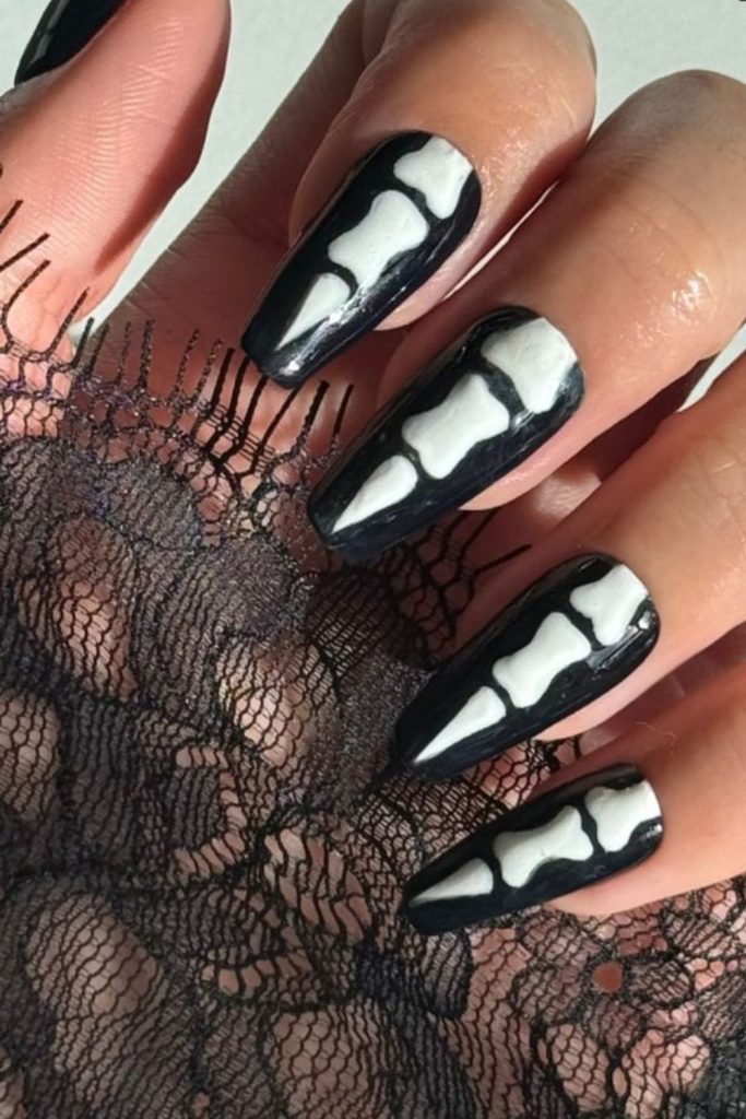 Bone fragment jagged skeletal nail style.