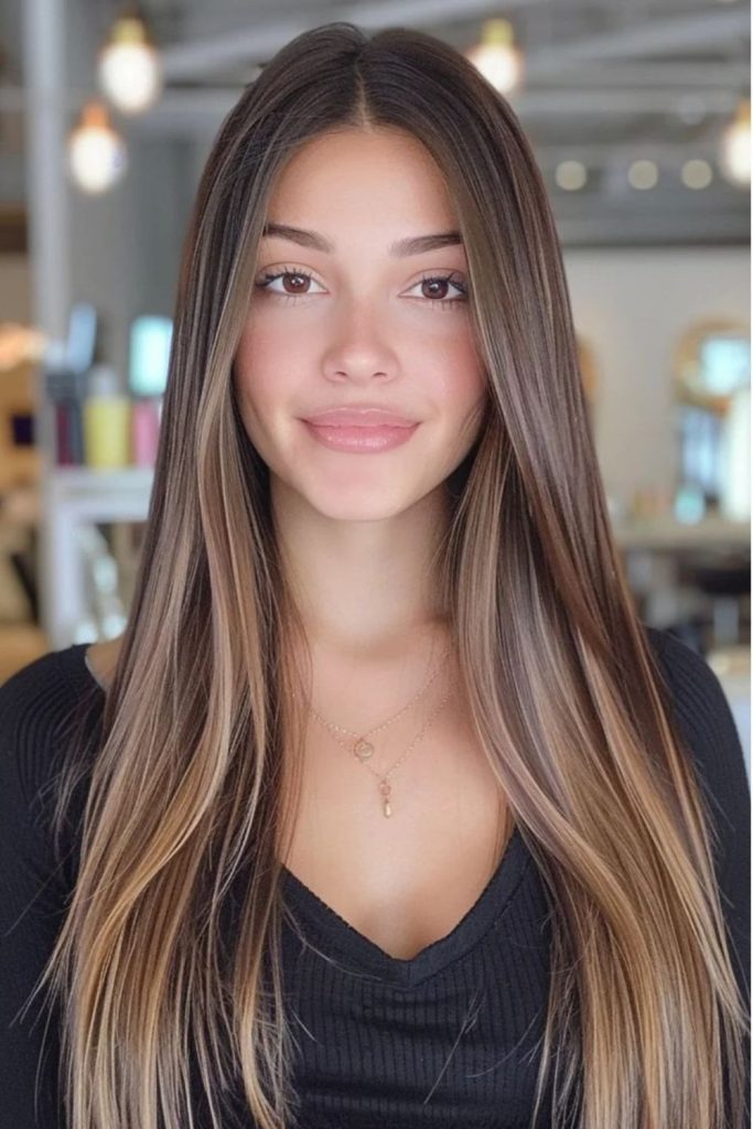 Caramel straight shiny flowing hair.