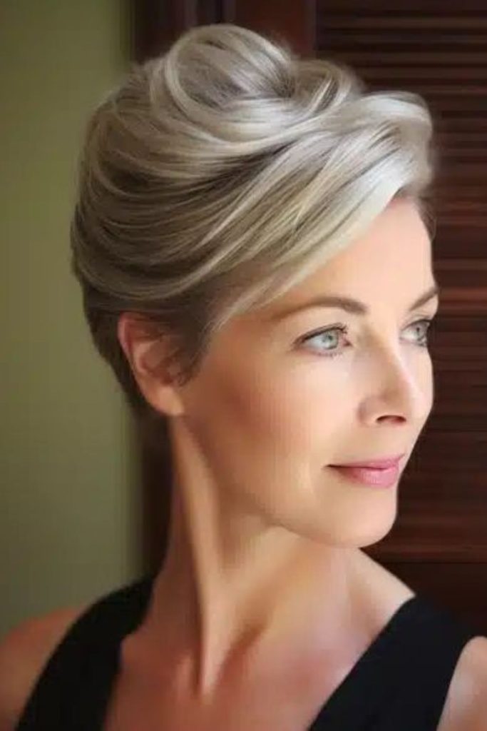 Regal updo with jeweled crown pins