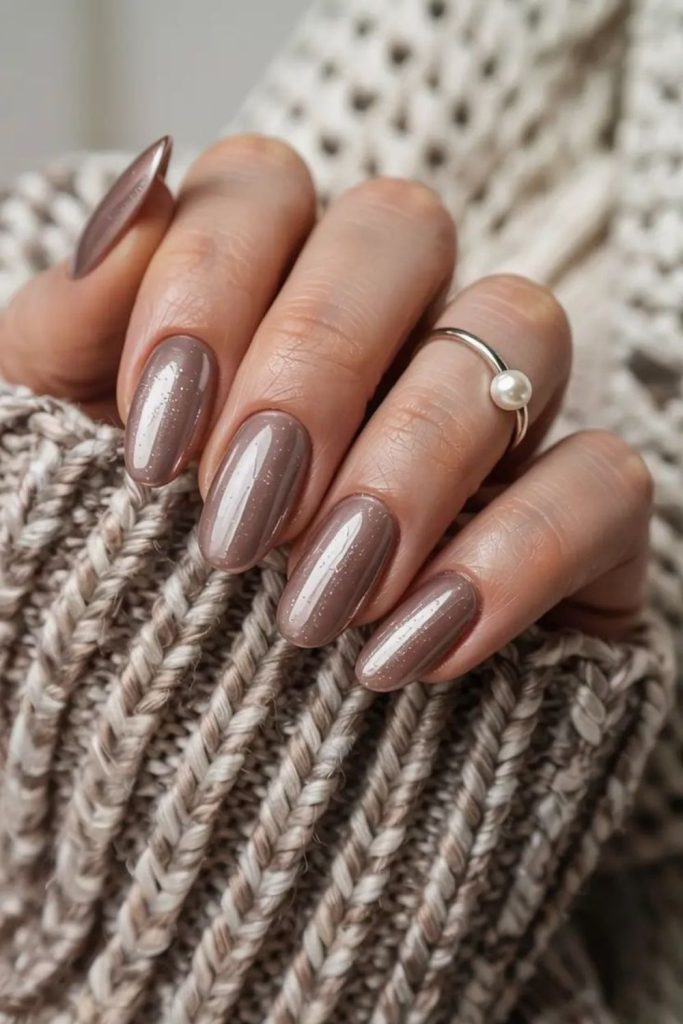 Silver frosted taupe mist nail style.