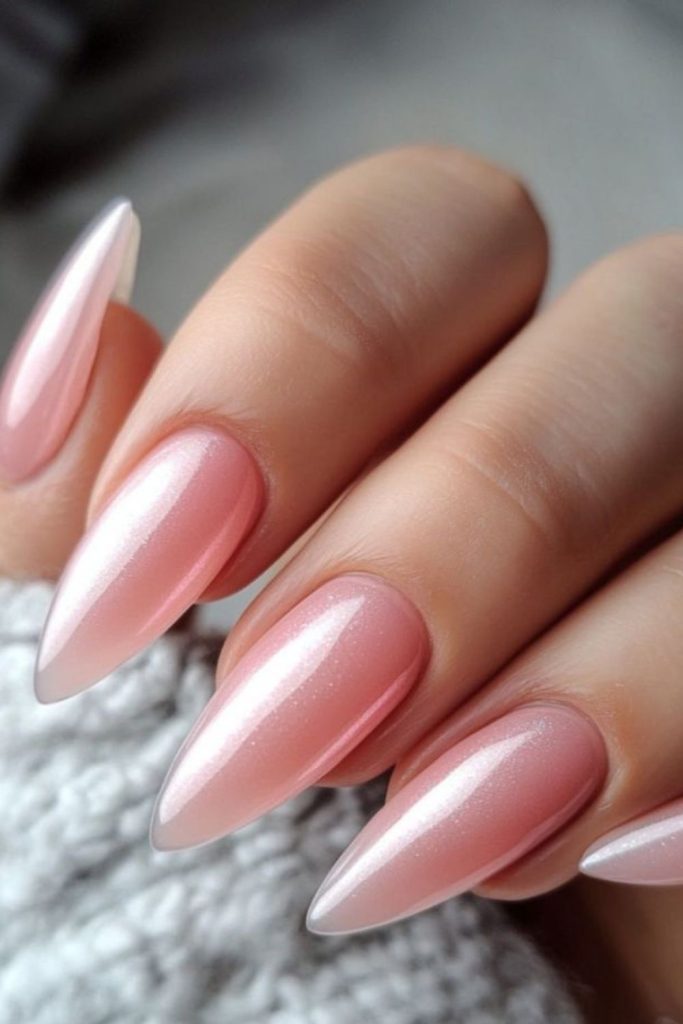 Champagne blush shimmering holiday nails.