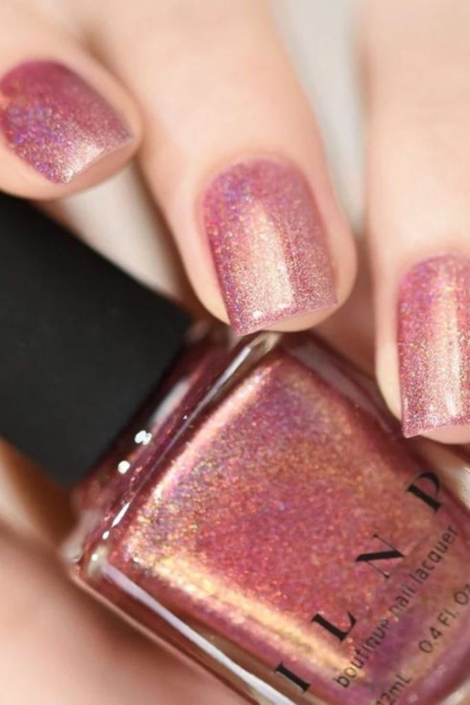 Dusty rose glitter cocoa nails.