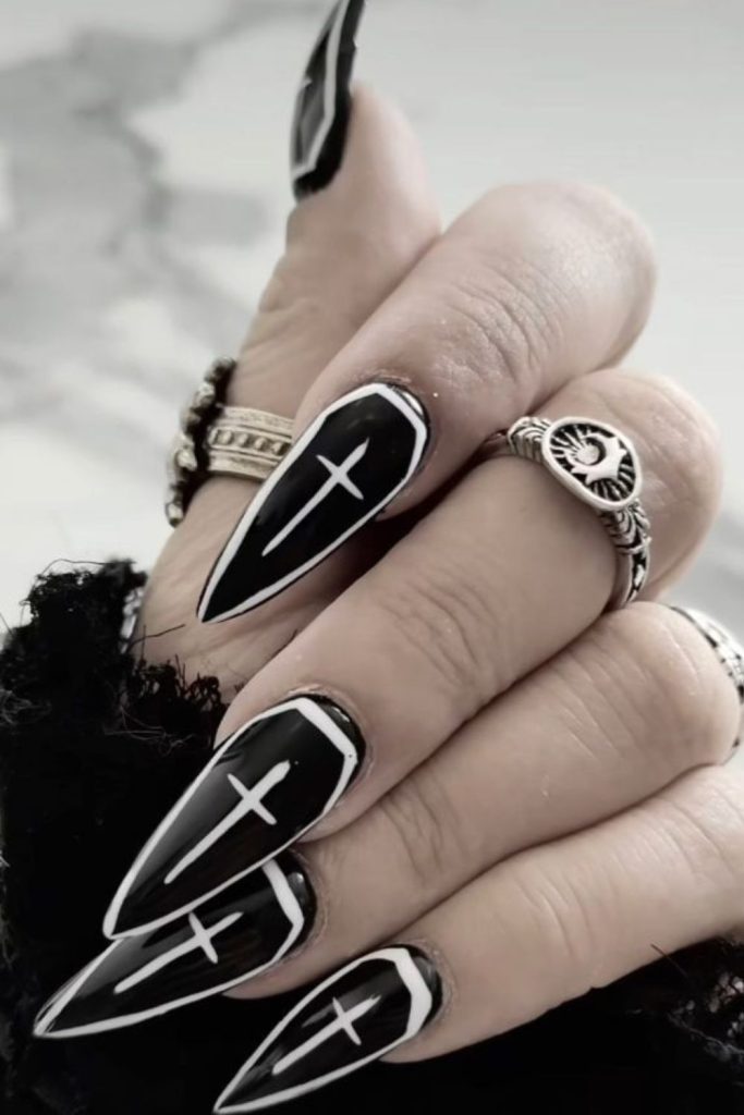 Gothic coffin matte black nail shape.
