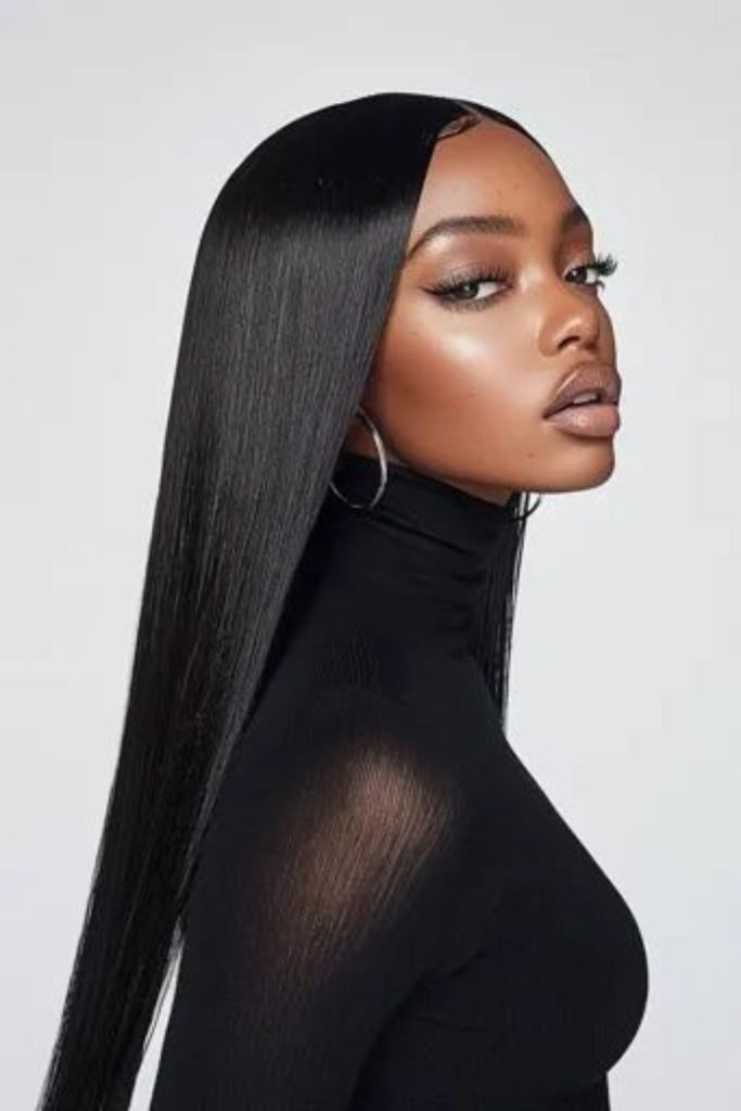 Jet-black sleek hairstyle with perfection.