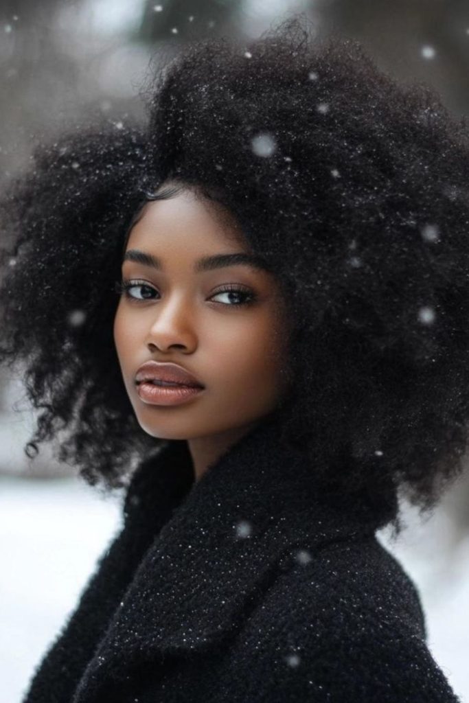 Bold afro halo with proud texture.