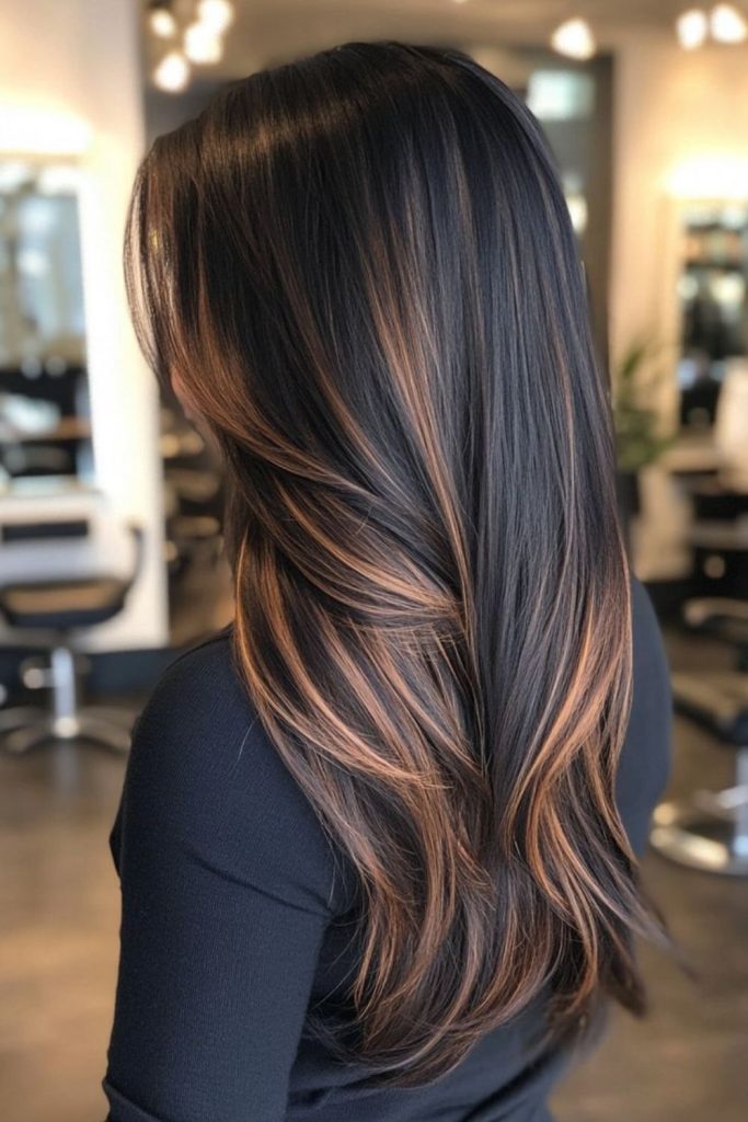 Honey-highlighted straight black strands.