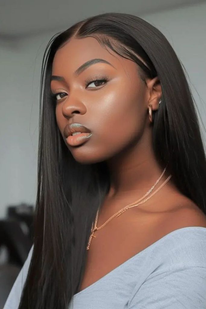 Midnight smooth sleek hairstyle.