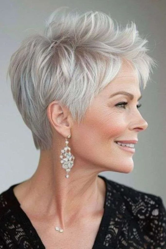 Ash-toned pixie with misty finish.