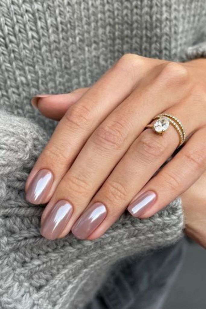 Beige silver moondust shimmer nails.