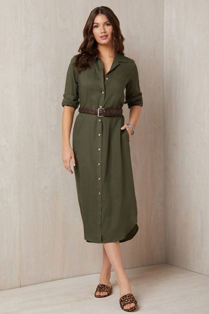 Olive dress layered with leather belt.