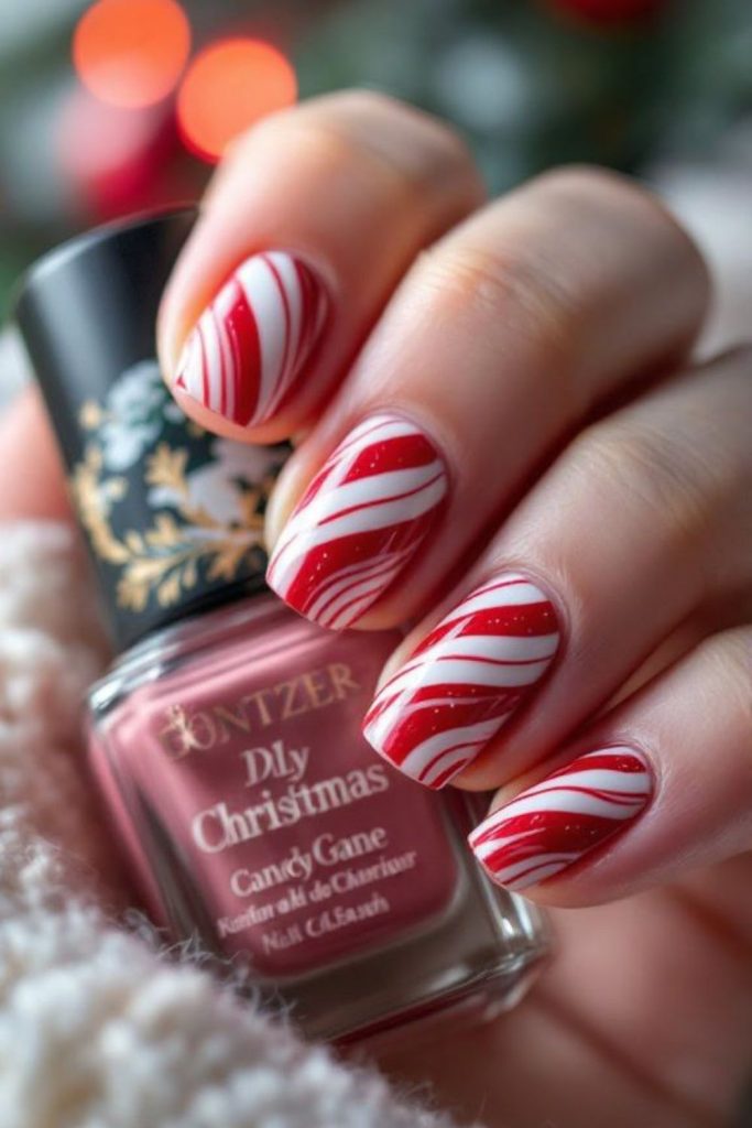 Peppermint red white stripe nails.