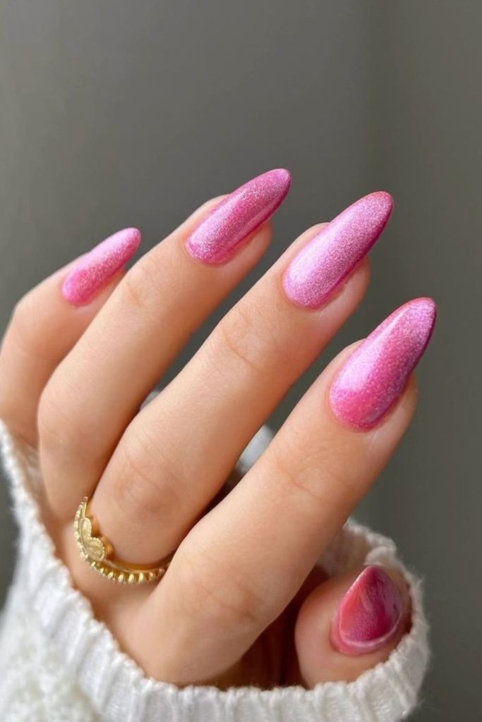 Glossy pink nails with icy glaze.