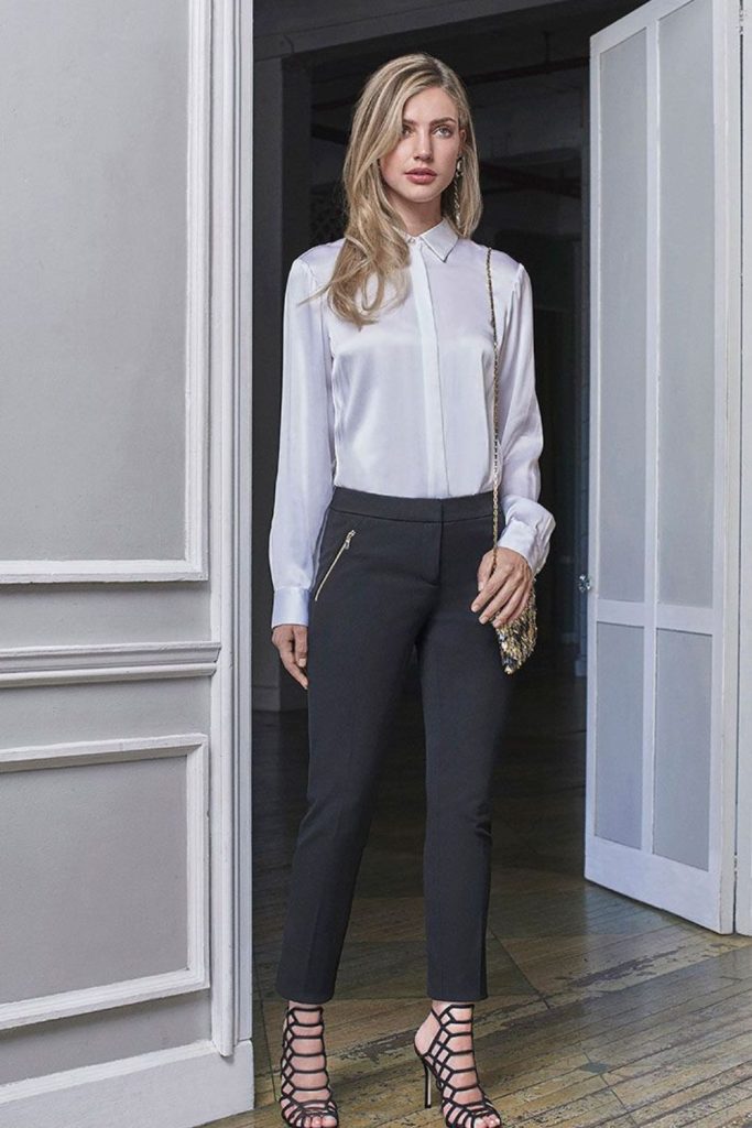 Gray blouse with slim black trousers.