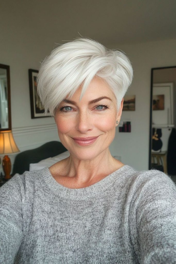 Platinum puff hairstyle with vintage flair.