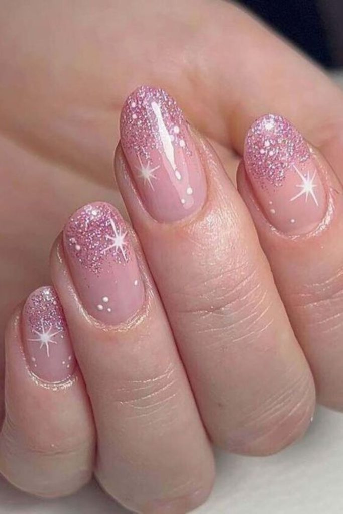 Glittery mauve ornament-inspired nails.